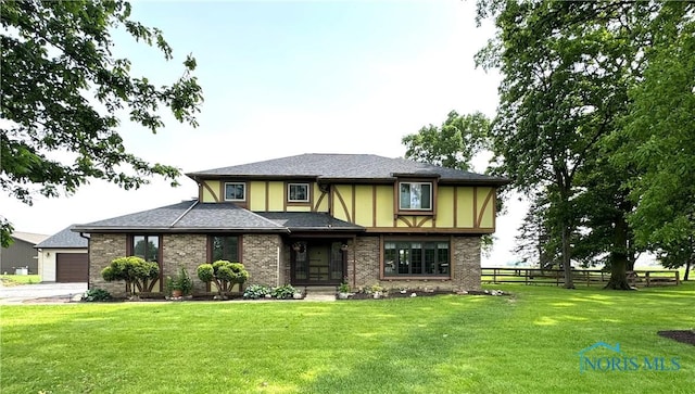 534 S Butternut St, Deshler, OH 43516 - tudor home featuring brick siding