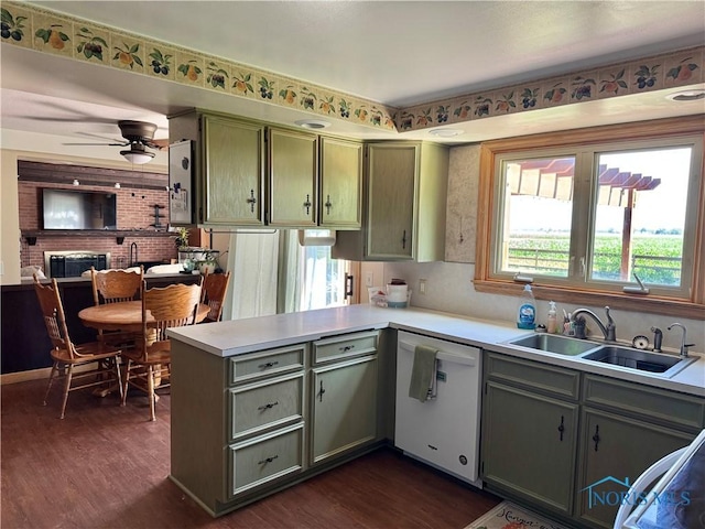 534 S Butternut St, Deshler, OH 43516 - kitchen with dishwasher, a peninsula, dark wood finished floors, and green cabinets