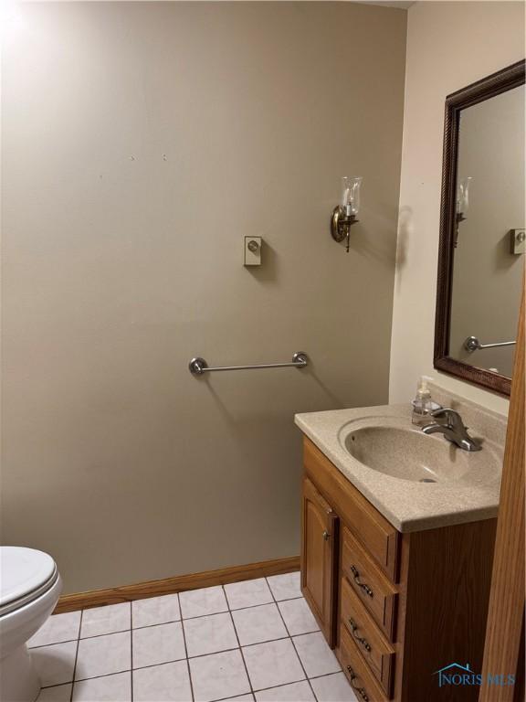 534 S Butternut St, Deshler, OH 43516 - bathroom featuring vanity and tile patterned flooring