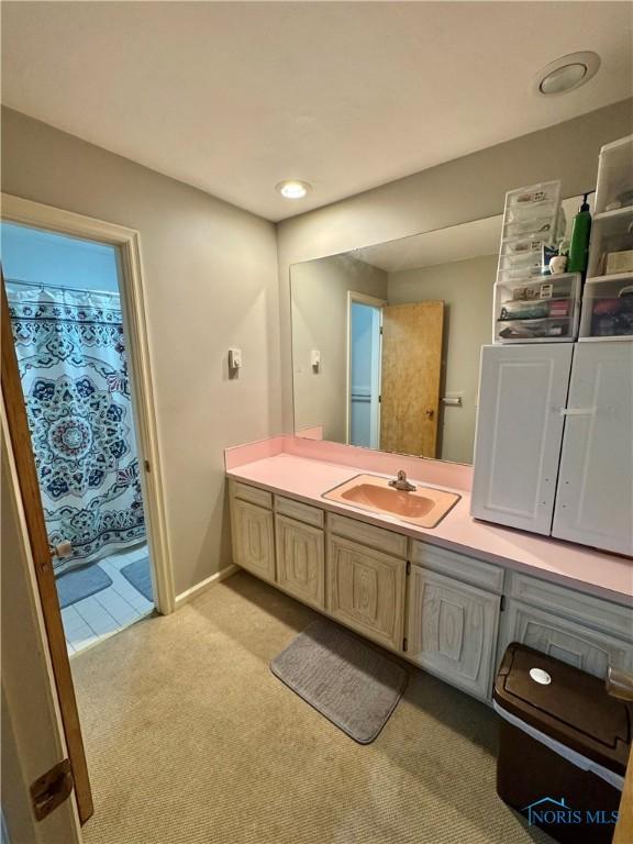 534 S Butternut St, Deshler, OH 43516 - full bath with vanity, recessed lighting, and a shower with shower curtain