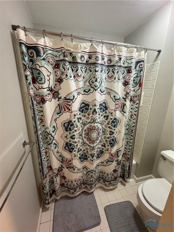 534 S Butternut St, Deshler, OH 43516 - full bathroom with toilet and tile patterned floors