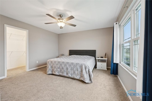 8805 Birchfield Rd, Sylvania, OH 43560 - bedroom with carpet, baseboards, and ceiling fan