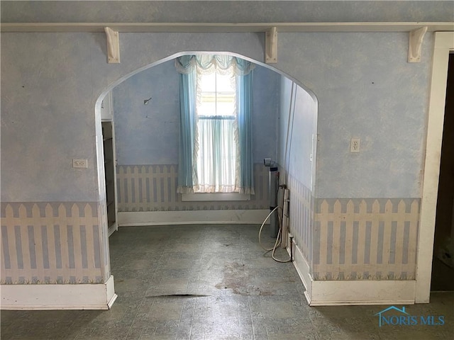 232 N Franklin St, Wauseon, OH 43567 - entrance foyer featuring arched walkways