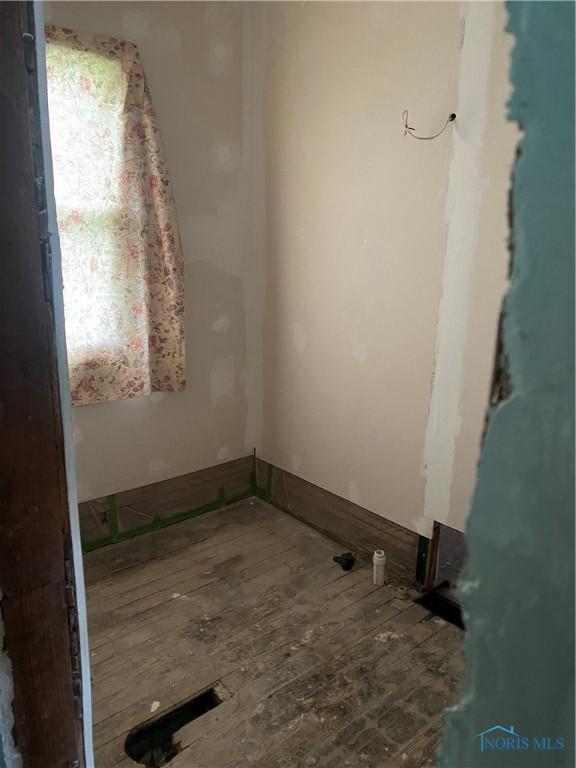 238 N Franklin St, Wauseon, OH 43567 - empty room featuring hardwood / wood-style floors
