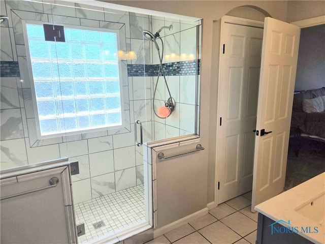 4811 Cabriolet Ln, Maumee, OH 43537 - bathroom featuring tile patterned flooring, a shower stall, and vanity