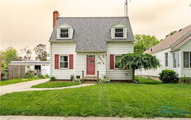 2834 123rd St, Toledo, OH 43611 - cape cod home with a shingled roof, a front lawn, and a chimney
