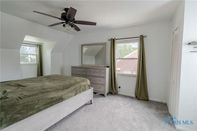 2834 123rd St, Toledo, OH 43611 - bedroom with light colored carpet, a ceiling fan, and baseboards