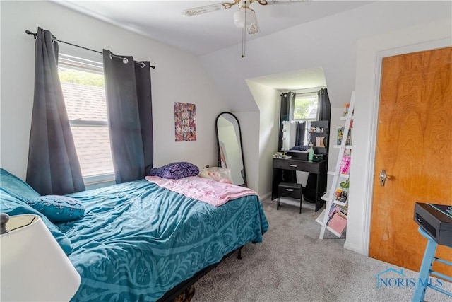 2834 123rd St, Toledo, OH 43611 - bedroom with carpet flooring, vaulted ceiling, and a ceiling fan