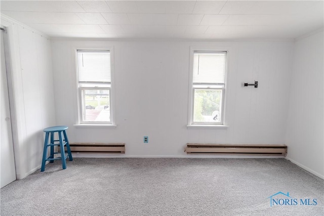 2834 123rd St, Toledo, OH 43611 - carpeted spare room with a baseboard radiator