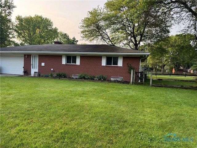 2102 Glen Arbor Dr, Toledo, OH 43614 - view of front of property featuring brick siding and a garage