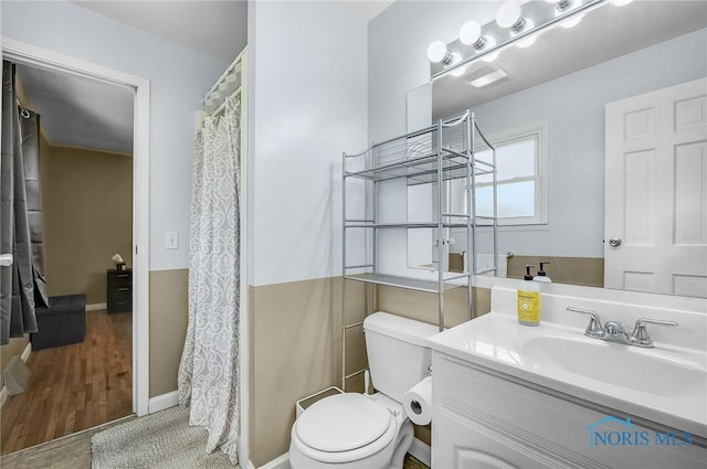 864 Maple Ln, Waterville, OH 43566 - full bath featuring vanity and wood finished floors