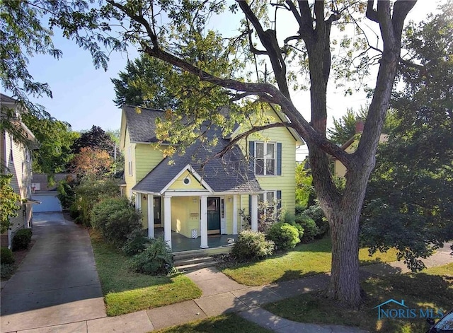 117 3rd St, Findlay, OH 45840 - view of front of property with a porch and a shingled roof