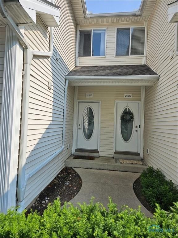 2607 W Village Dr, Toledo, OH 43614 - entrance to property featuring a shingled roof