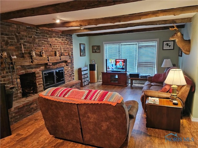 110 Harbor Point Rd, Rossford, OH 43460 - living area featuring a fireplace, wood finished floors, beam ceiling, ceiling fan, and baseboards