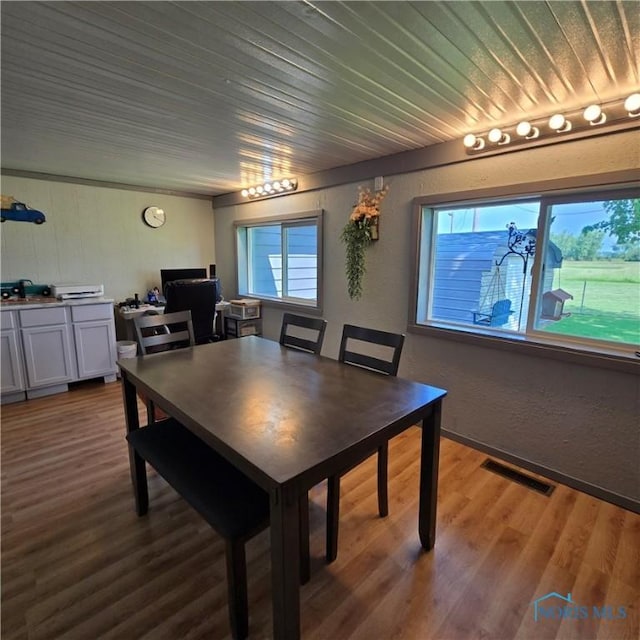 1154 Lagrange St, Napoleon, OH 43545 - dining area with plenty of natural light, wood finished floors, wooden ceiling, a desk, and a textured wall
