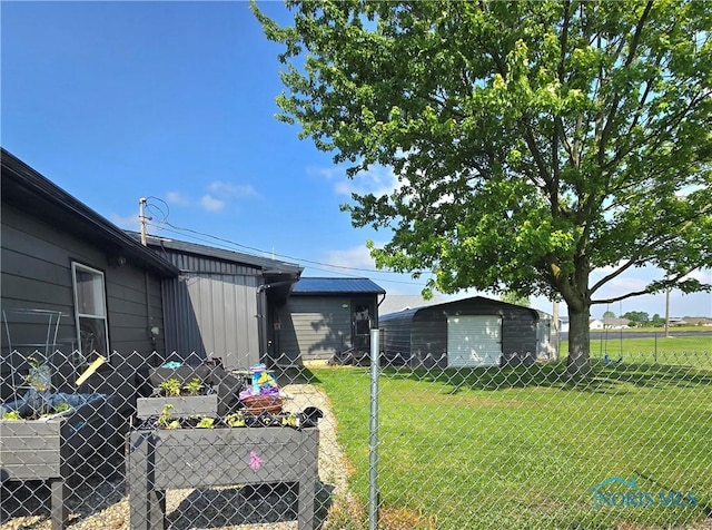 1154 Lagrange St, Napoleon, OH 43545 - view of yard featuring a garage