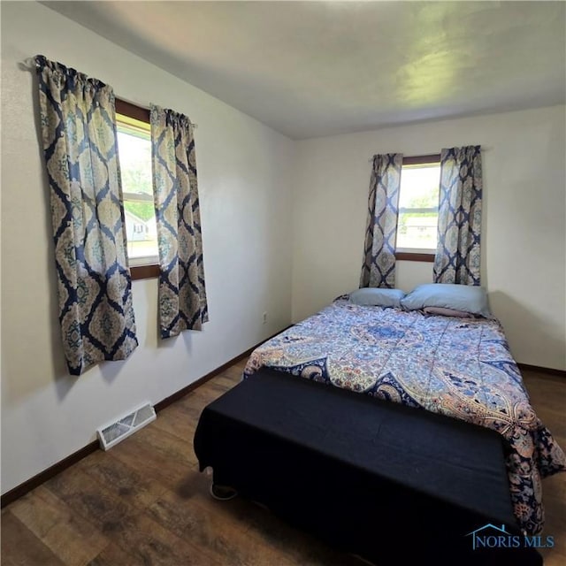 1154 Lagrange St, Napoleon, OH 43545 - bedroom featuring dark wood finished floors and baseboards