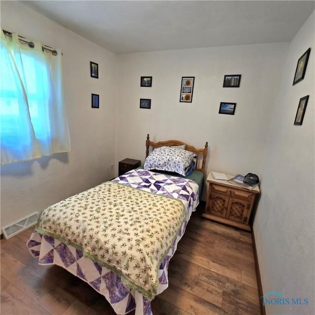 1154 Lagrange St, Napoleon, OH 43545 - bedroom featuring hardwood / wood-style floors