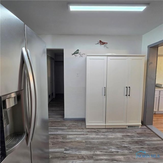 1154 Lagrange St, Napoleon, OH 43545 - kitchen with stainless steel fridge with ice dispenser and wood finished floors