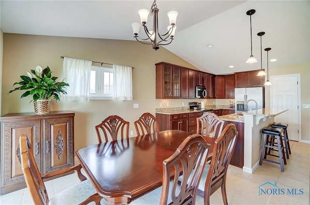 8971 N Park Lake Cir, Sylvania, OH 43560 - dining space featuring a chandelier, lofted ceiling, light tile patterned floors, and recessed lighting