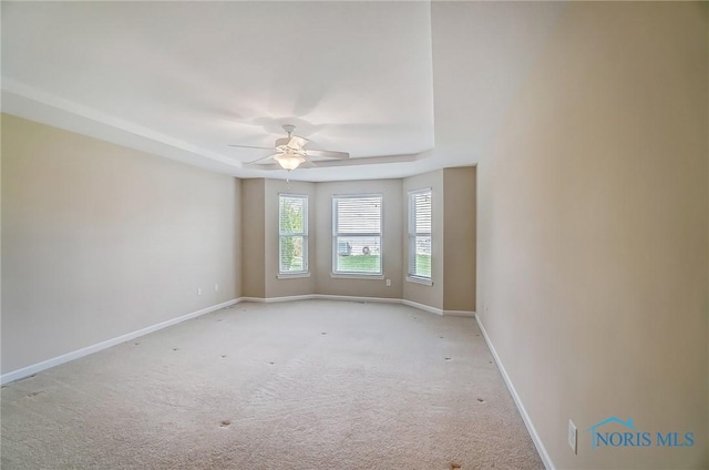 8971 N Park Lake Cir, Sylvania, OH 43560 - spare room featuring light colored carpet and a ceiling fan