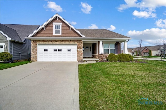 8971 N Park Lake Cir, Sylvania, OH 43560 - craftsman-style home with stone siding, concrete driveway, a front lawn, and a garage