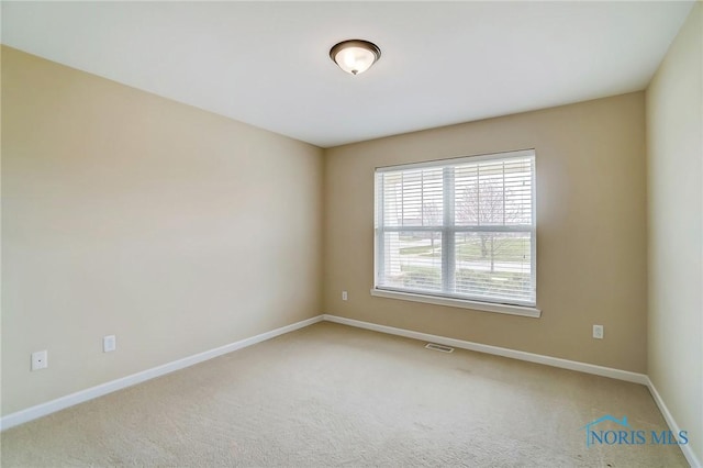 8971 N Park Lake Cir, Sylvania, OH 43560 - carpeted spare room with baseboards