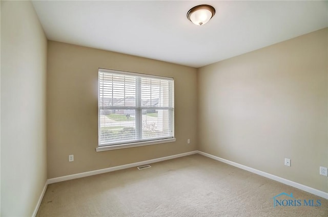 8971 N Park Lake Cir, Sylvania, OH 43560 - carpeted empty room with baseboards