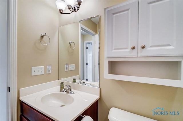 8971 N Park Lake Cir, Sylvania, OH 43560 - bathroom featuring vanity and toilet