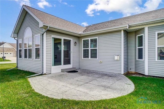 8971 N Park Lake Cir, Sylvania, OH 43560 - back of house with a patio, a yard, and a shingled roof