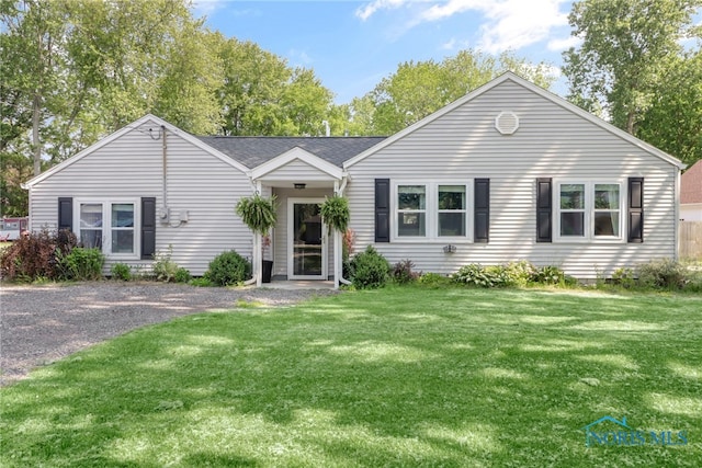 6564 Blossman Rd, Toledo, OH 43617 - single story home featuring a front lawn
