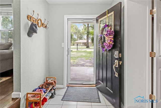6564 Blossman Rd, Toledo, OH 43617 - entrance foyer featuring tile patterned flooring and baseboards