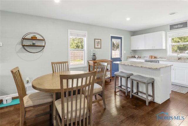 6564 Blossman Rd, Toledo, OH 43617 - dining area featuring dark wood-type flooring and recessed lighting