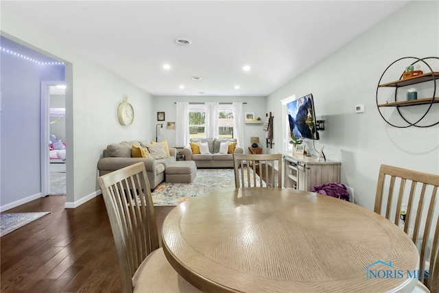 6564 Blossman Rd, Toledo, OH 43617 - dining area with dark wood-style floors and recessed lighting