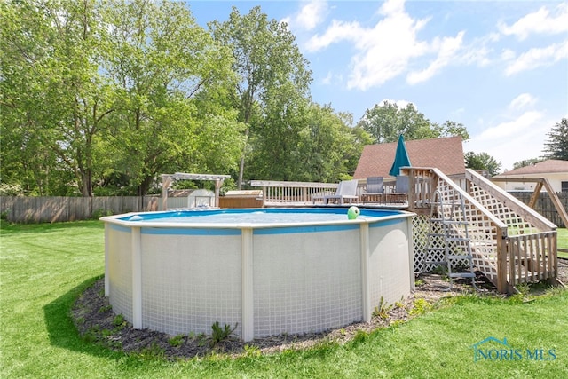 6564 Blossman Rd, Toledo, OH 43617 - view of pool with a deck