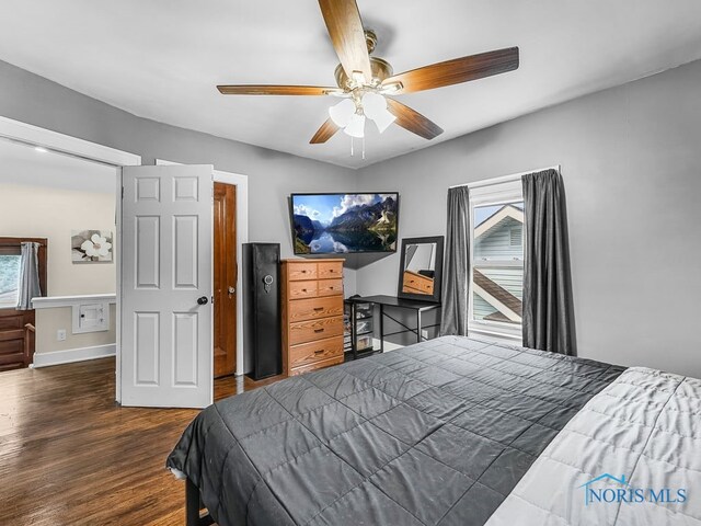 2238 Oak Grove Pl, Toledo, OH 43613 - bedroom with wood finished floors, ceiling fan, and baseboards
