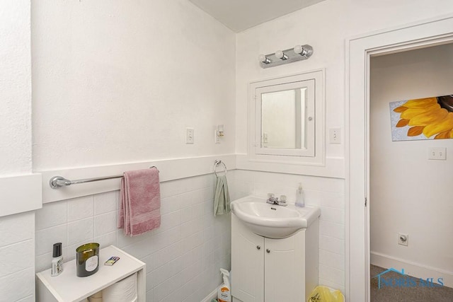 4405 Vermaas Ave, Toledo, OH 43612 - bathroom featuring vanity and tile walls