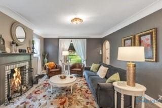 3643 Kershaw Ave, Toledo, OH 43613 - living area with ornamental molding, a brick fireplace, and arched walkways