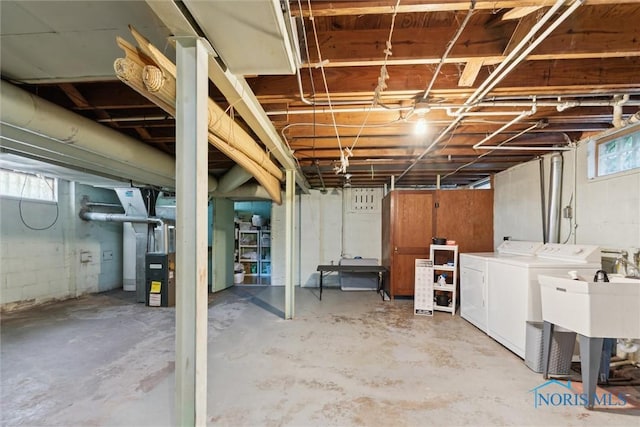 3643 Kershaw Ave, Toledo, OH 43613 - below grade area featuring washer and dryer and heating unit