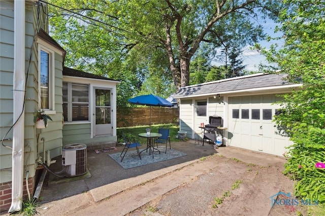 3643 Kershaw Ave, Toledo, OH 43613 - view of patio with an outbuilding, a grill, and outdoor dining space