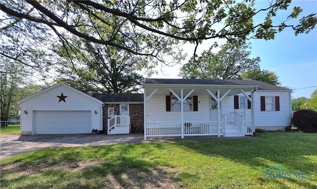 1649 N Perry St, Ottawa, OH 45875 - view of front facade with driveway, an attached garage, a porch, and a front yard