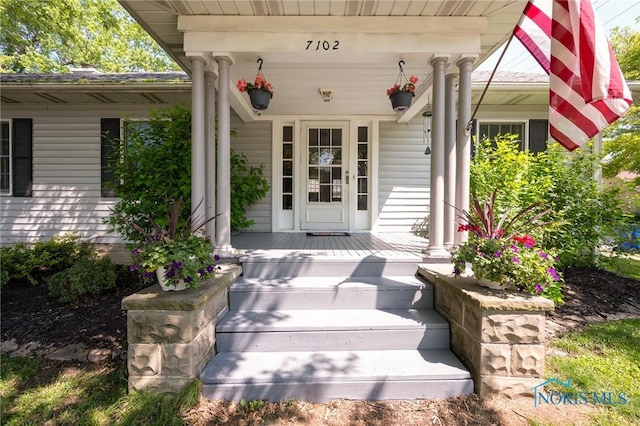 7102 Hall St, Holland, OH 43528 - entrance to property featuring a porch