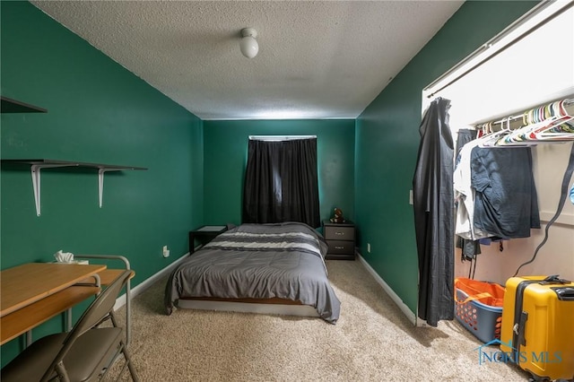 7102 Hall St, Holland, OH 43528 - bedroom with a textured ceiling, carpet flooring, and baseboards