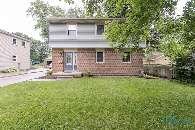 716 Maple St, Perrysburg, OH 43551 - view of front facade with brick siding