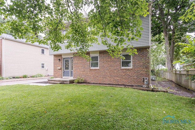 716 Maple St, Perrysburg, OH 43551 - view of front of home with brick siding