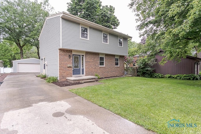716 Maple St, Perrysburg, OH 43551 - colonial-style house featuring brick siding, an outbuilding, and a garage