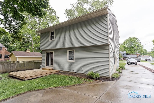 716 Maple St, Perrysburg, OH 43551 - back of property featuring a deck