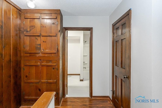 716 Maple St, Perrysburg, OH 43551 - hallway with wood finished floors and a textured ceiling
