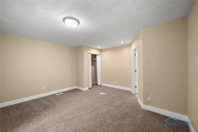 902 Coventry Ave, Toledo, OH 43607 - unfurnished room with a textured ceiling, carpet floors, baseboards, and recessed lighting