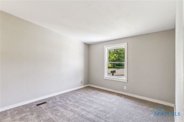 304 Wise St, Forest, OH 45843 - carpeted spare room with baseboards